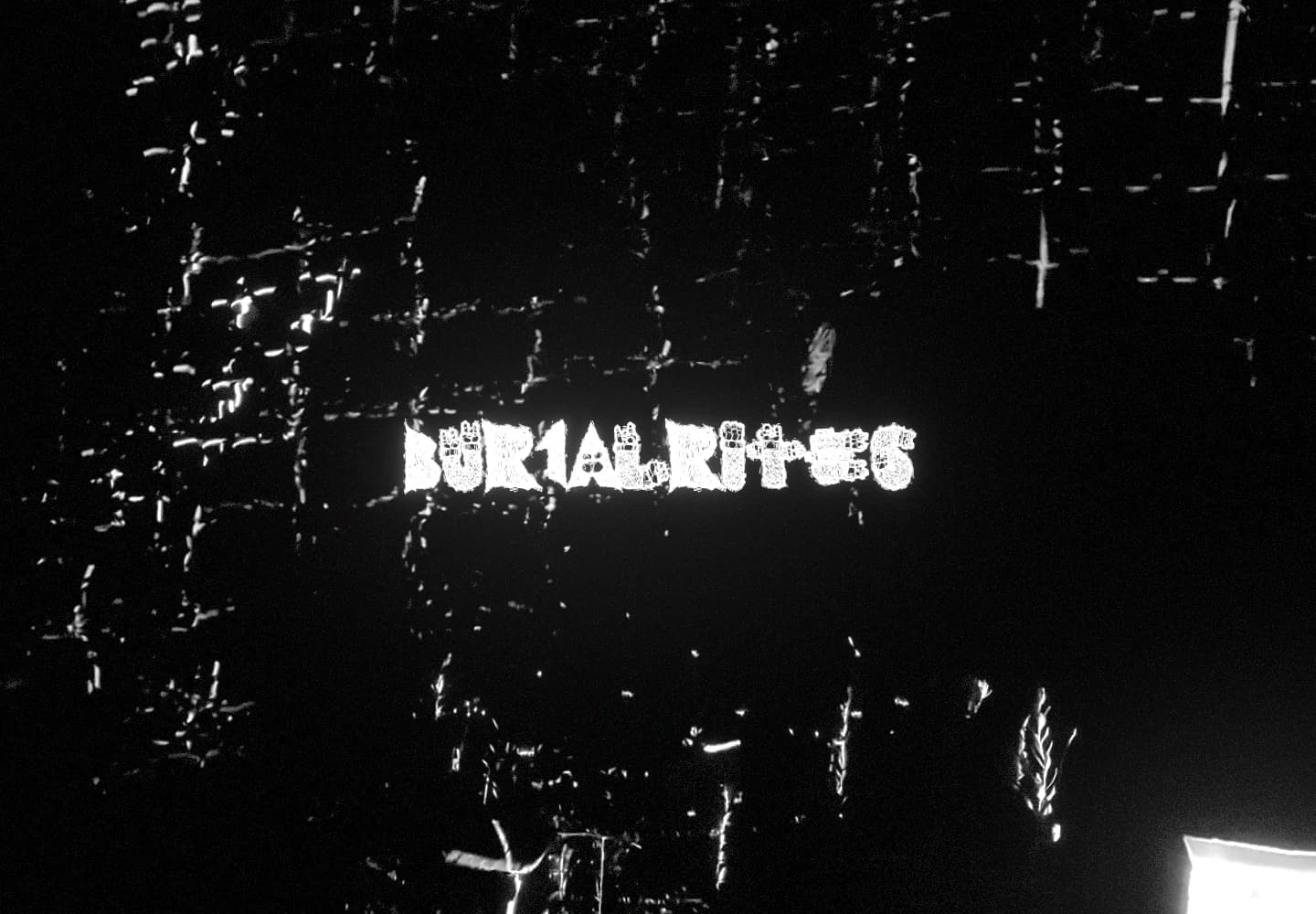 The bur1alrites wordmark glowing over a grainy, black-and-white video background.